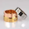 Bague d'amant de couleur or rose en acier inoxydable à la mode pour femmes hommes couple anneaux de cristal CZ bijoux de luxe cadeau de mariage avec boîte originale