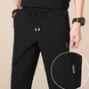Summer Fashion Men's Casual Pants Cool and Light Slim-fit Solid Color Drawstring Trousers Young Students Trend Street Clothing Y0811