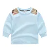 T-shirt en coton pour enfants, de haute qualité, à la mode, décontracté, pour garçons et filles, chemise à bascule, col rond, manches longues, hauts blancs, printemps 2022