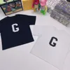 夏の素敵な男の子の女の子の服セットキッズラウンドネックTシャツ +ショーツスーツ幼児カジュアルファッショントラックスーツの子供たち