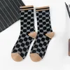 High quality Hip Hop Harajuku Style men's socks Unisex Breathable Cotton Geometric Checkered Long Tube Woman Skateboard Socks