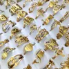 100pcs lot Laser Cutting Rings for Women Styles Mix Gold Stainless Steel Charm Ring Girls Birthday Party Favor Female Beautiful Je288J