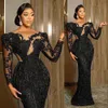 2022 Sexy Sequins Arabic Dubai Prom Dresses Black Sequined Lace Bling Crystal Beads Long Sleeves Mermaid Plus Size Party Evening Gowns Cutaway Sides Floor Length