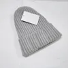 10 stücke Winter frühling Weihnachten Hüte Für mann frauen sport Mode Mützen Skullies Chapeu Caps Baumwolle Gorros Wolle warme mütze gestrickte kappe 7 farben