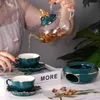 デザインガラスティーポットとセラミックグリーンふたの熱予熱キャンドルホルダーセットカップソーサージュース茶水ケトル210621