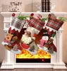 Il regalo di Natale del fumetto creativo calza il commercio all'ingrosso del produttore di alta qualità delle decorazioni dell'alce del pupazzo di neve di Babbo Natale
