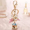 Keychains Lanyards Söt nyckelring Pearl Crystal String Carousel for Women Key Chain Jewelry Presenttillbehör Llaveros Para Mujer Drop Ship