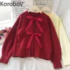 Korobov hiver coréen doux laçage arc femmes cardigans bureau coréen dame O cou manches bouffantes pull style preppy Sueter Mujer 210430