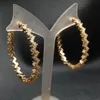 Trendy Wave Cubic Zirconia Pave Gold Color Plated Hoop örhängen för kvinnliga tillbehörsmycken Pendientes Mujer Moda Huggie