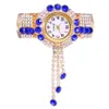 Nya kvinnor tittar på guld armband armband design damer blomma runt full kristall diamantkedja pendell klänning kvarts klockor