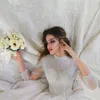 Bruidsjurk Arabisch Dubai 2024 Luxe A-lijn kanten tuddingjurk Illusie Volledige kralenparels Mouwen Vestidos de noiva Robe de mariage
