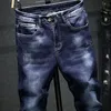 Mäns Jeans 2022 Elastiska och Tonåringar Casual Byxor Koreansk version Slimmade Down Trousers Blue Clothing Fashion