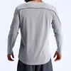 メンズトラックスーツ服Tees Polos Tシャツ男性フィットネススポーツトップ通気性と迅速な乾燥ランニングトレーニング長袖汗吸収性ラウンドネックロングTシャツ