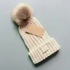 Luxury päls pom poms kid hat mode vinter hattar för barn kepsar baby solid färg designer stickade mössa