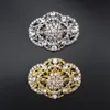 Épingles, broches 60mm broche pour hommes haute mode ovale honorable magique aglimmer strass brillant / doré broche broche, article N ° d'article: BH765