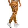 Soltar homens calças lápis longas calças 2022 moda casual slim joggers color de cor sólida calça de moletom PLUS TAMANHO CHAKI BLACK CINZ