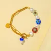 Set di braccialetti multicolori fatti a mano etnici bohémien a maglie per le donne Lettere di moda Perline di perle Coppie Gioielli Boho Fawn22