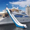 Utomhusspel Anpassad uppblåsbar vatten Yacht Slide Commercial Fun Play Equipment Air Dock Slide for Boat