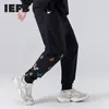 IEFB весенние брюки мужские хип-хоп случайные черные спортивные штаны мода свободные спортивные брюки вышитые упругие талии свободные брюки 210524