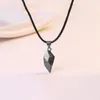 Collana con ventosa magnetica a forma di cuore Ciondolo per coppia di amanti della pietra nera + bianca con catena da 60 cm
