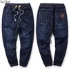 Stor storlek jeans m-8xl plus män kinesiska stil byxor bomull manlig militär man långa byxor lös 9 färg män