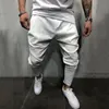 Pantaloni da jogging incrociati da uomo Hip Hop Streetwear Pantaloni da pista alla moda casual Pantaloni da tuta comodi solidi da uomo Pantaloni larghi da uomo