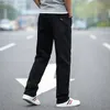 Nouveaux hommes classiques droites jeans noirs mode business décontracté élastique pantalon lâche pantalon de marque mâle plus taille 40 42 44 210331