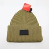 Vinterlock män designers beanie hattar kvinnor solid färg stickad hatt randiga brev kepsar