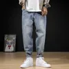 Projektant mody Mężczyźni Jeans Japoński Vintage Luźne Dżnkie Dżnuse Spodnie Retro Light Blue Streetwear Szerokie nogi Baggy Spodnie