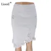 Liooil algodão assimétrico preto buraco branco denim midi saia com tassel streetwear alta cintura lavagem afligida mulheres bodycon saia 210408