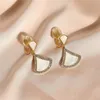 Coreano squisito lusso placcato oro 18 carati conchiglia a forma di ventaglio clip per orecchio gioielli temperamento donne dolci micro set orecchini zircone senza fori per le orecchie