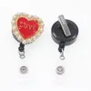 Pins, broscher 1/10 / 50pcs / lot emalj med pärla / rhinestone hjärtaform kärlek id märke hållare infällbar rulle för kvinnor flicka