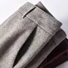 Pantaloni di lana Harem da donna Matita Autunno Inverno Vita alta Casual Addensato Tweed Pantaloni da donna da ufficio a piede piccolo Capris