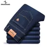 Shan bao herfst lente ingebouwde rechte stretch denim jeans klassieke stijl badge jeugd heren zaken casual broek 211111