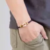 Stahltitan -Armband vier Farbe geflochten