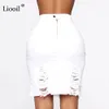 Лиоил асимметричный хлопок черная белая дырка джинсовая юбка MIDI с кисточкой уличной одежды с высокой талией мытью женщин Bodycon юбка 210408