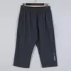 Hommes pantalons courts Gym séchage rapide sport course 7 Points pantalon imprime entraînement Fitness 3/4 pantalon fermeture éclair poche survêtement pantalon de survêtement