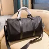 Top qualité hommes mode sac de voyage en nylon noir sacs de voyage hommes poignée bagages gentleman affaires fourre-tout avec bandoulière louange et explosion P001