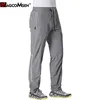 MAGCOMSEN pantalons de survêtement à séchage rapide hommes pantalons de jogging décontractés gymnases Fitness entraînement vêtements de sport pantalon taille élastique piste d'été 210715