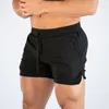 Muscleguys New Summer Mens Gyms Shorts Fitness Mode Casual Joggers Entraînement Bodybuilding Mesh Short de plage à séchage rapide 210421