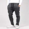 2019 Harem pantalones nuevo estilo moda casual pantalones de chándal flacos pantalones negros pantalones gota entrepierna pantalones de sudor hombres joggers barato gris x0723