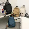 DCIMOR Products Unisex Backpack韓国カジュアル学生のための大容量の学校バッグ純粋な色の女性の旅行バッグ210929