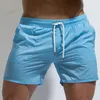 Męskie seksowne półprzezroczyste gimnastyczne fitness Sport Swim Beach Surf Surf Shorts Wygodne suche oddychanie deski pływające męskie spodnie262L