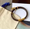 Bracciale con lettera di lusso Braccialetti in oro Donna Uomo in pelle a doppio ponte Fibbia in oro di alta qualità Bracciale con serratura di marca Pendenti Annivers2975