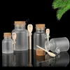 コルクキャップとスプーンバスソルトマスクパウダークリームパッキングボトルメイクアップストレージ瓶DAS68を持つ曇りのあるプラスチック化粧品のボトルの容器
