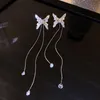 女性韓国のファッションジュエリーS925針の光沢のあるジルコンギフトのための銀色の水晶蝶タッセルイヤリング