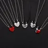 Pendentif Colliers Evispol Une paire de collier d'amant magnétique de mode noir et blanc souhait pierre aimant créatif coeur couple cadeau 2059