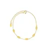 gold leaf anklet.