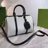 Designer- Femmes Sacs de mode Messenger Sac de voyage Style classique Sacs de mode Épaule Lady Totes sacs à main 32 cm