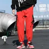 Красная уличная одежда ленты случайные брюки мужские тонкие мужские бегуны брюки боковые карманы хлопчатобумажные брюки x0723